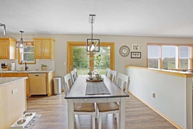 371 Thurow Dr, Oconomowoc, WI 53066 - dining room with light wood finished floors and baseboards