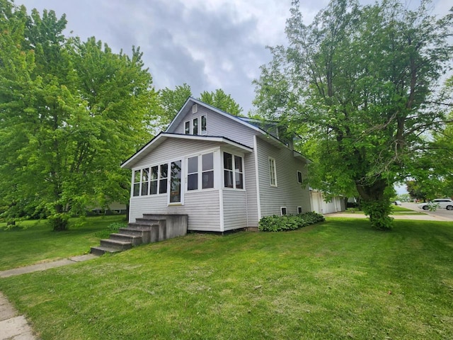 409 W Spence St, Colby, WI 54421 - view of front of house with a front lawn and a garage