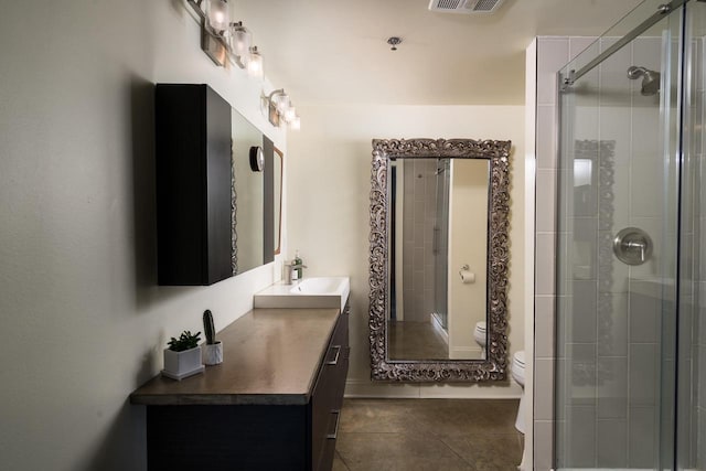 3059 N Weil St Unit 124, Milwaukee, WI 53212 - full bath featuring toilet, tile patterned floors, vanity, and a stall shower