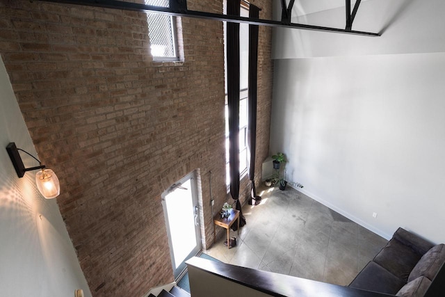 3059 N Weil St Unit 124, Milwaukee, WI 53212 - below grade area with brick wall and baseboards