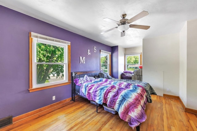 108 Healy Ct, Shawano, WI 54166 - bedroom featuring wood finished floors, baseboards, and ceiling fan