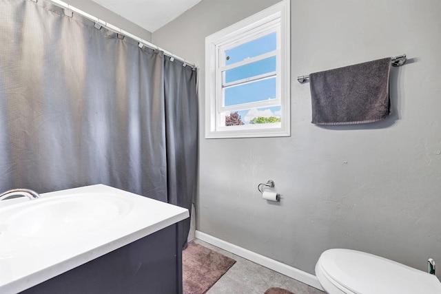 108 Healy Ct, Shawano, WI 54166 - bathroom featuring toilet, baseboards, vanity, and a shower with shower curtain