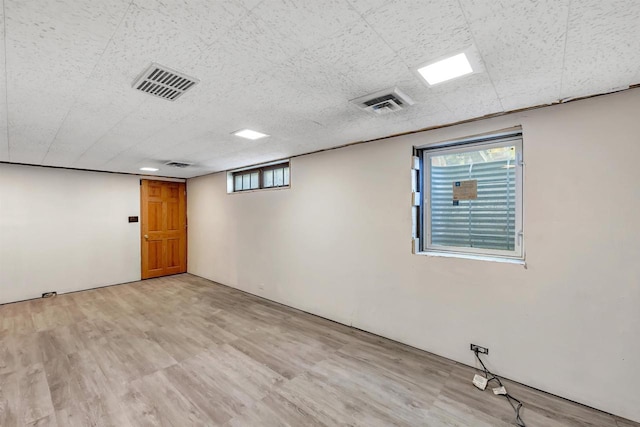 108 Healy Ct, Shawano, WI 54166 - empty room featuring wood finished floors and healthy amount of natural light