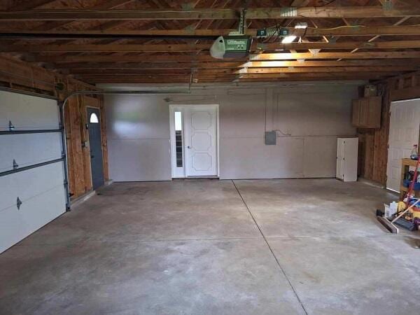 810 Railroad Ave, Viroqua, WI 54665 - garage featuring a garage door opener