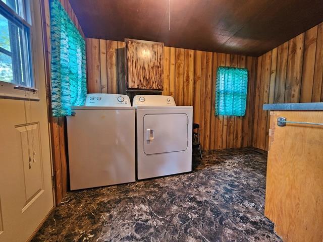 5183 2nd Ave, Pittsville, WI 54466 - laundry room with washing machine and clothes dryer, wooden walls, and wooden ceiling