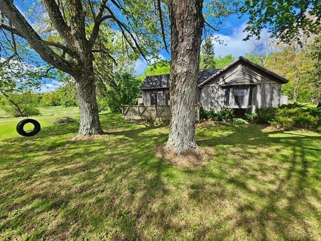 5183 2nd Ave, Pittsville, WI 54466 - view of grassy yard featuring a deck