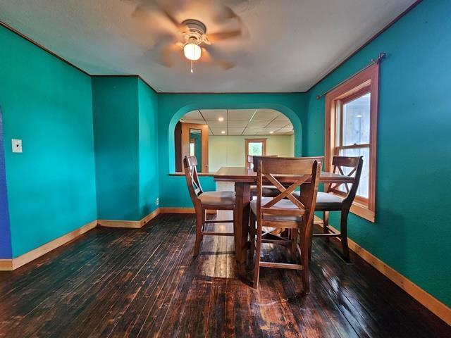 5183 2nd Ave, Pittsville, WI 54466 - dining space featuring baseboards, hardwood / wood-style floors, ceiling fan, arched walkways, and recessed lighting