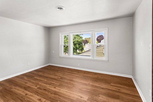 4648 S Kansas Ave Unit 4650, Saint Francis, WI 53235 - unfurnished room with wood finished floors and baseboards