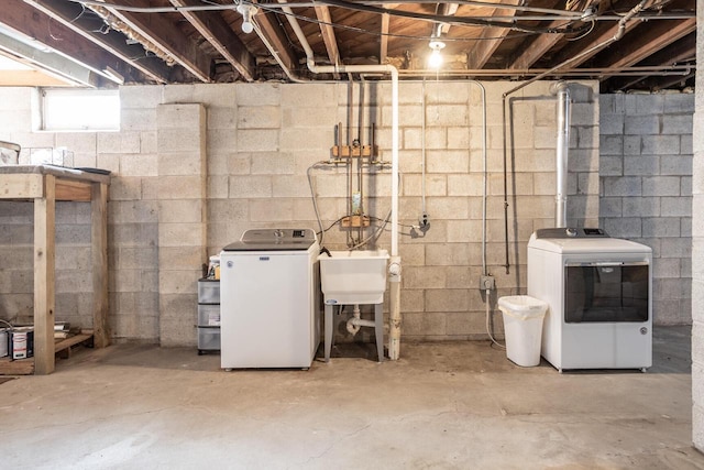 4648 S Kansas Ave Unit 4650, Saint Francis, WI 53235 - below grade area featuring independent washer and dryer and a sink