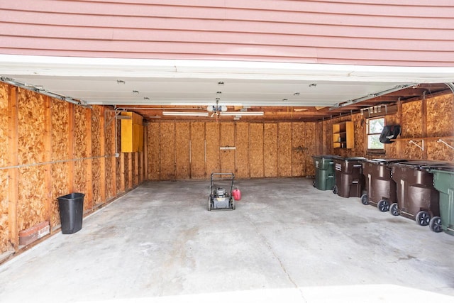 4648 S Kansas Ave Unit 4650, Saint Francis, WI 53235 - garage featuring a garage door opener
