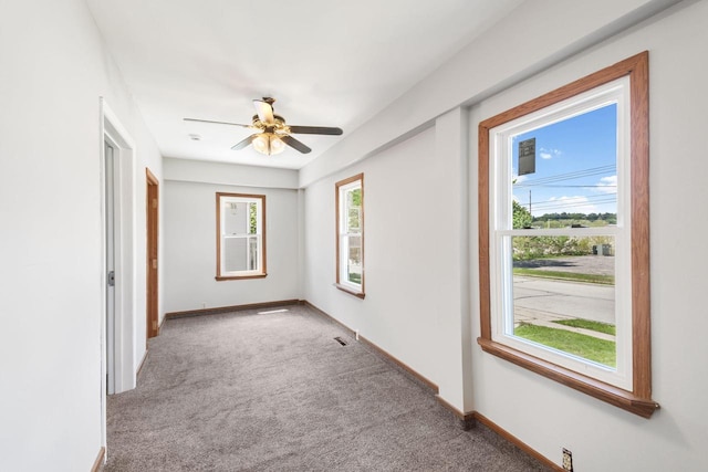1925 Salisbury Rd, West Bend, WI 53090 - carpeted spare room with ceiling fan and baseboards