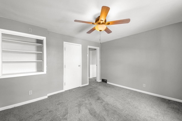 1925 Salisbury Rd, West Bend, WI 53090 - unfurnished bedroom with carpet, baseboards, and a ceiling fan
