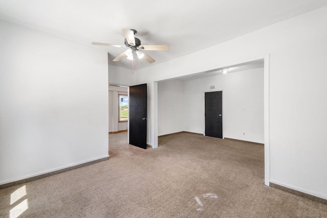 1925 Salisbury Rd, West Bend, WI 53090 - carpeted empty room with ceiling fan and baseboards