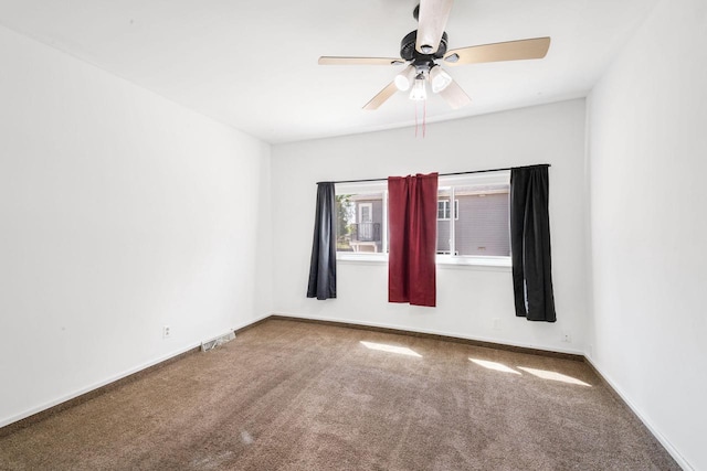1925 Salisbury Rd, West Bend, WI 53090 - spare room with carpet floors, ceiling fan, and baseboards