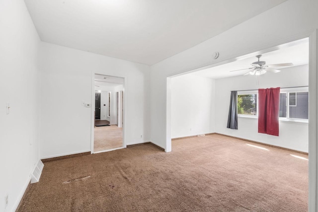 1925 Salisbury Rd, West Bend, WI 53090 - carpeted empty room featuring ceiling fan and baseboards