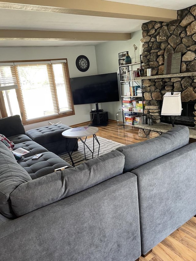 N101W16063 Santa Fe Dr, Germantown, WI 53022 - living room featuring wood finished floors, beam ceiling, and baseboards