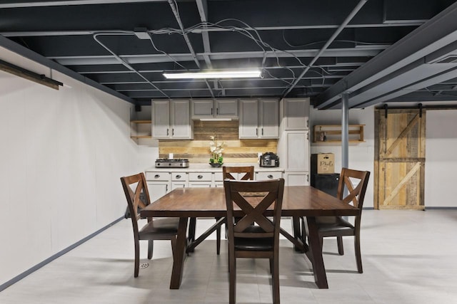 N101W16063 Santa Fe Dr, Germantown, WI 53022 - dining area with baseboards and a barn door