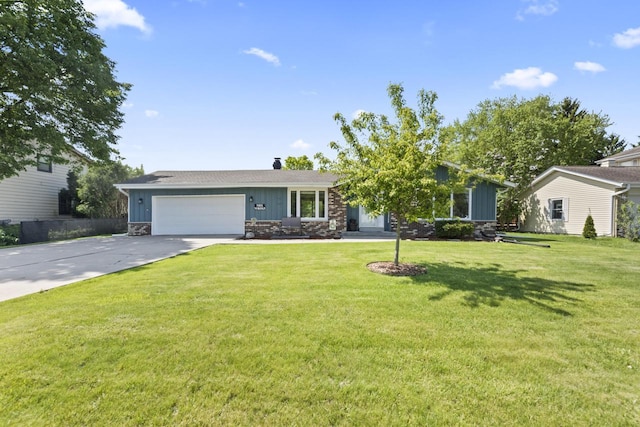 N101W16063 Santa Fe Dr, Germantown, WI 53022 - view of front of house with an attached garage, driveway, board and batten siding, and a front yard