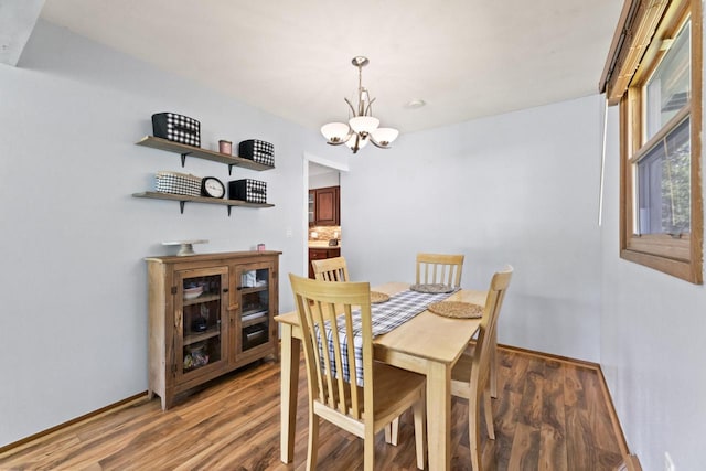 N101W16063 Santa Fe Dr, Germantown, WI 53022 - dining space with a chandelier, light wood finished floors, and baseboards