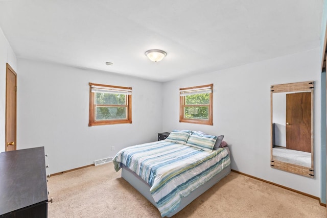 N101W16063 Santa Fe Dr, Germantown, WI 53022 - bedroom featuring light carpet and baseboards