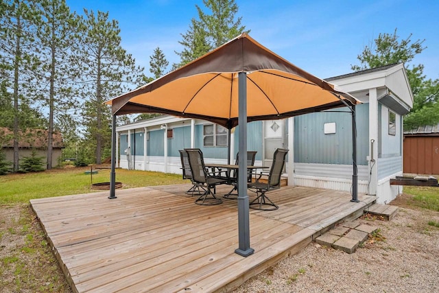 N9578 Dahleen Ln, Crivitz, WI 54114 - wooden terrace featuring a gazebo, outdoor dining space, and a yard