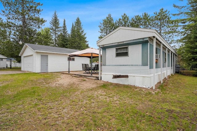 N9578 Dahleen Ln, Crivitz, WI 54114 - view of front facade with a front lawn, an outbuilding, a gazebo, and a garage