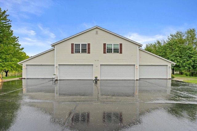 660 Wood River Ct Unit 1, West Bend, WI 53095 - view of garage