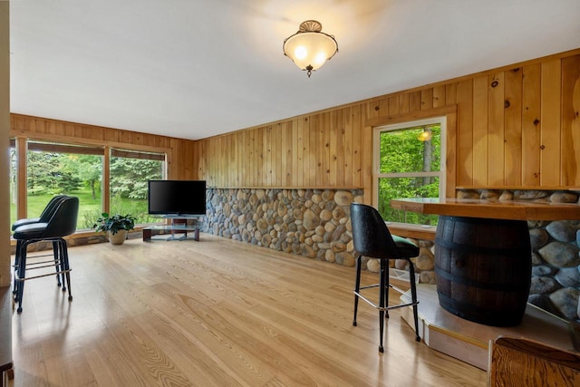 3324 County Highway Cc, Slinger, WI 53086 - living area with light wood-style floors and wood walls