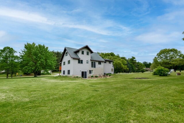 E3581 Green Valley Dr, La Valle, WI 53941 - view of side of property featuring a yard
