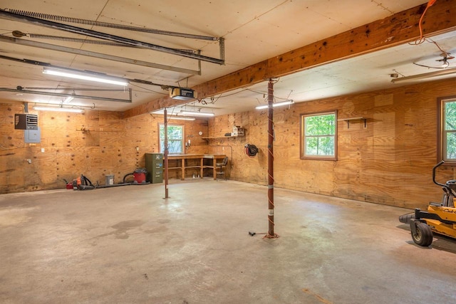 N9056 16th Ave, Neshkoro, WI 54960 - garage with a garage door opener and a workshop area