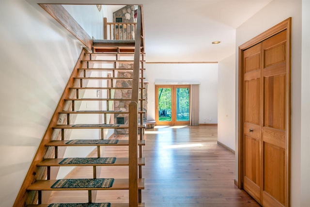 N9056 16th Ave, Neshkoro, WI 54960 - stairs with wood finished floors, recessed lighting, and french doors