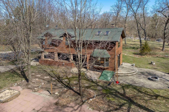 N9056 16th Ave, Neshkoro, WI 54960 - view of side of property with a shingled roof