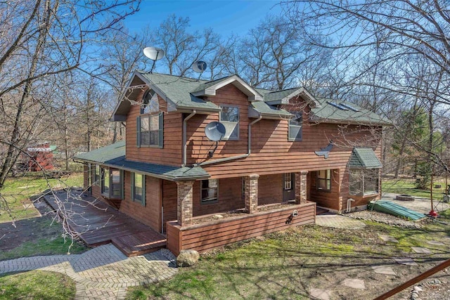 N9056 16th Ave, Neshkoro, WI 54960 - chalet / cabin featuring a porch and a shingled roof