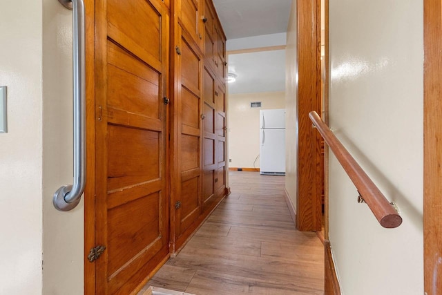 203 E 1st St, Kimberly, WI 54136 - hall featuring light wood-style floors and baseboards