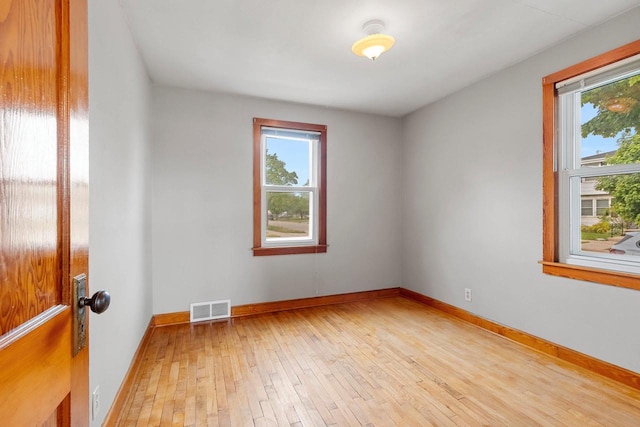 203 E 1st St, Kimberly, WI 54136 - empty room featuring light wood-style flooring and baseboards