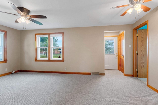 203 E 1st St, Kimberly, WI 54136 - empty room with a ceiling fan, light colored carpet, and baseboards