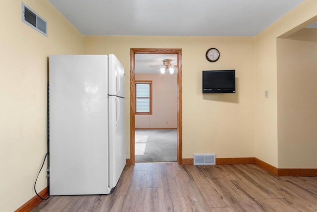 203 E 1st St, Kimberly, WI 54136 - spare room with light wood-style floors, baseboards, and a ceiling fan