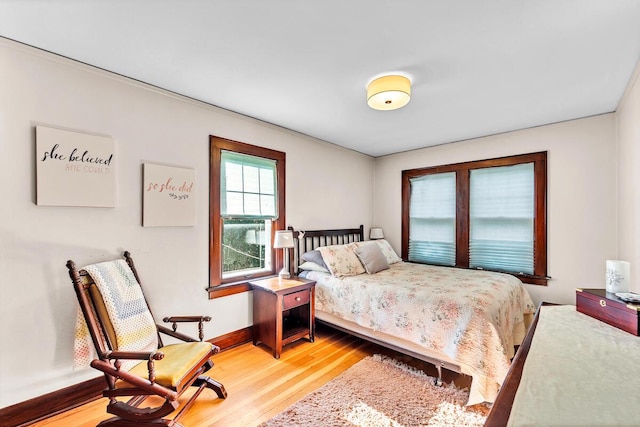 2254 N 73rd St, Wauwatosa, WI 53213 - bedroom with light wood-style floors and baseboards