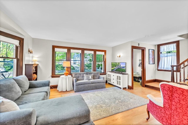 2254 N 73rd St, Wauwatosa, WI 53213 - living area featuring plenty of natural light, light wood finished floors, and baseboards