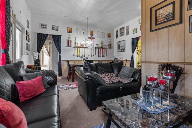 805 N State St, Appleton, WI 54911 - living area featuring carpet flooring, ornamental molding, and wood walls