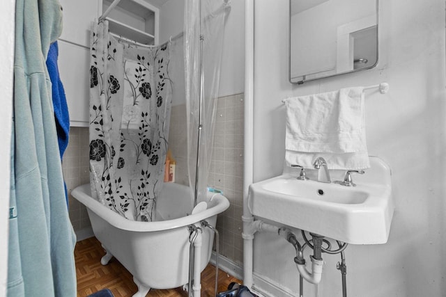 805 N State St, Appleton, WI 54911 - full bathroom featuring tile walls and a wainscoted wall