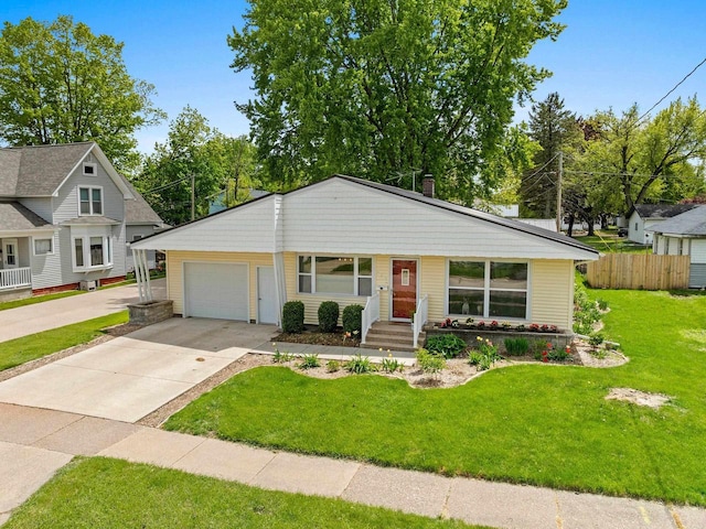 410 E Washington St, New London, WI 54961 - view of front of property with a garage and concrete driveway