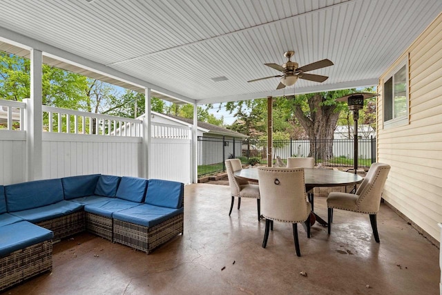 410 E Washington St, New London, WI 54961 - sunroom with an outdoor living space, ceiling fan, and outdoor dining area