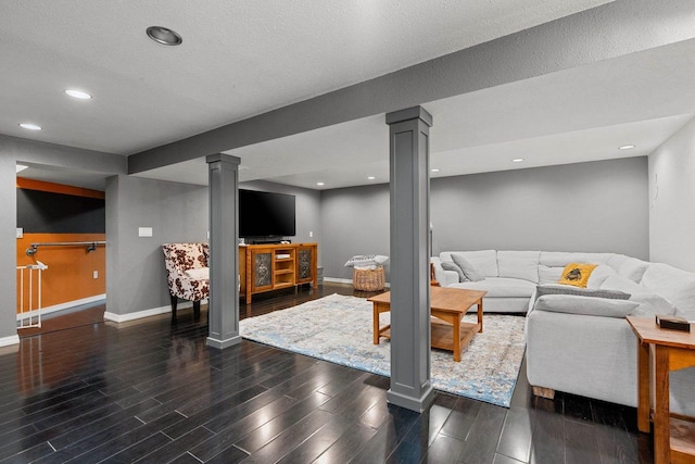 410 E Washington St, New London, WI 54961 - living room featuring decorative columns, baseboards, wood finished floors, and recessed lighting