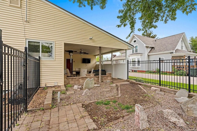 410 E Washington St, New London, WI 54961 - rear view of property with ceiling fan and a patio