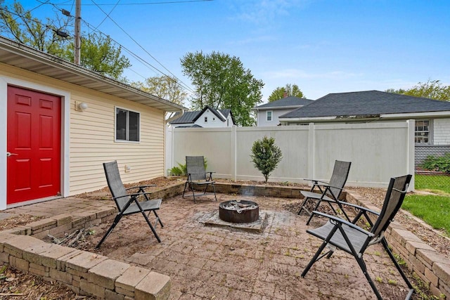 410 E Washington St, New London, WI 54961 - view of patio with an outdoor fire pit