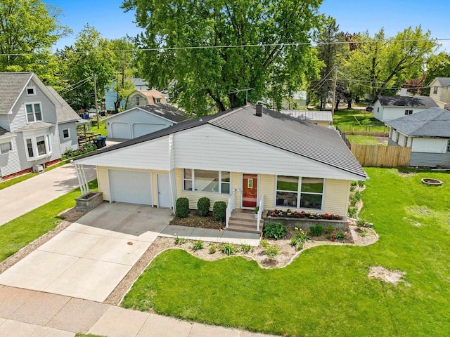 410 E Washington St, New London, WI 54961 - view of front of home with an attached garage and driveway