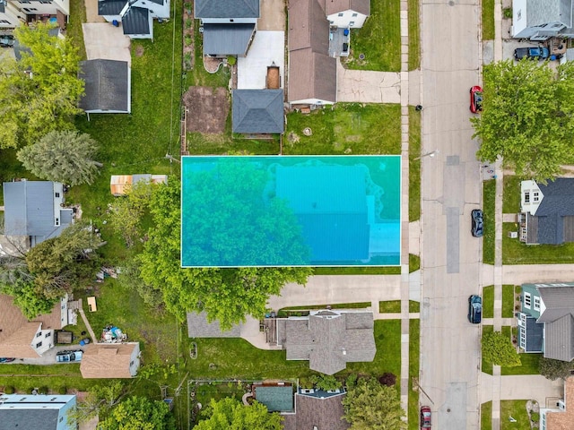 410 E Washington St, New London, WI 54961 - aerial view of residential area with a pool