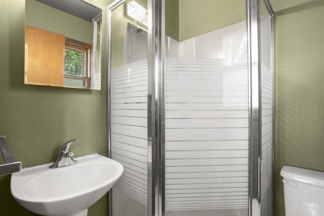 1054 Oxford Ct, Neenah, WI 54956 - full bath with a sink, a shower stall, and toilet