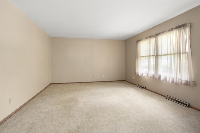 1054 Oxford Ct, Neenah, WI 54956 - spare room with light colored carpet and baseboards